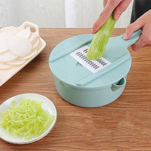 Handy kitchen cutter and grater combo tool
